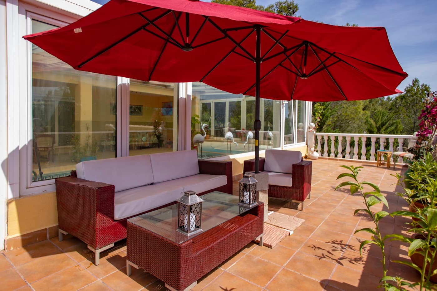 Sunny terrace with lounge and mountain views
